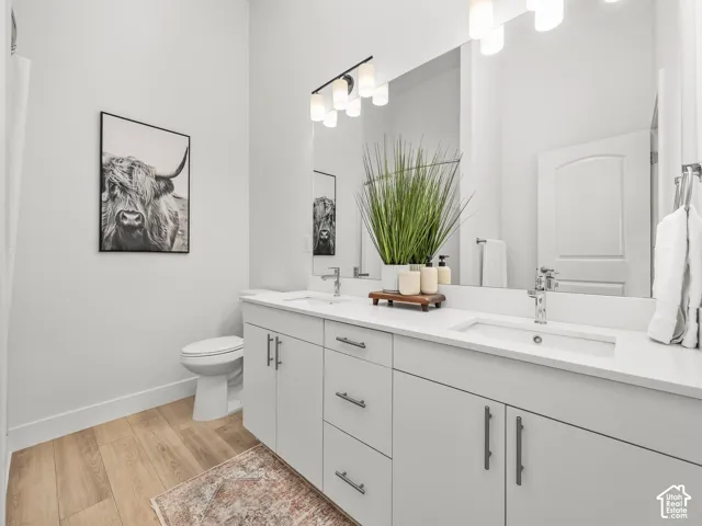 Private Primary bathroom with double vanity and walk in shower.