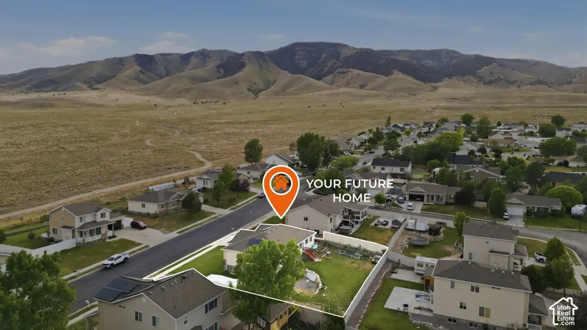 Suburban residential setting with a mountain backdrop