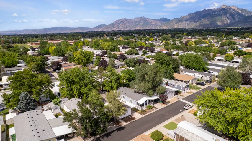 Aerial view of a residential community featuring numerous manufactured homes