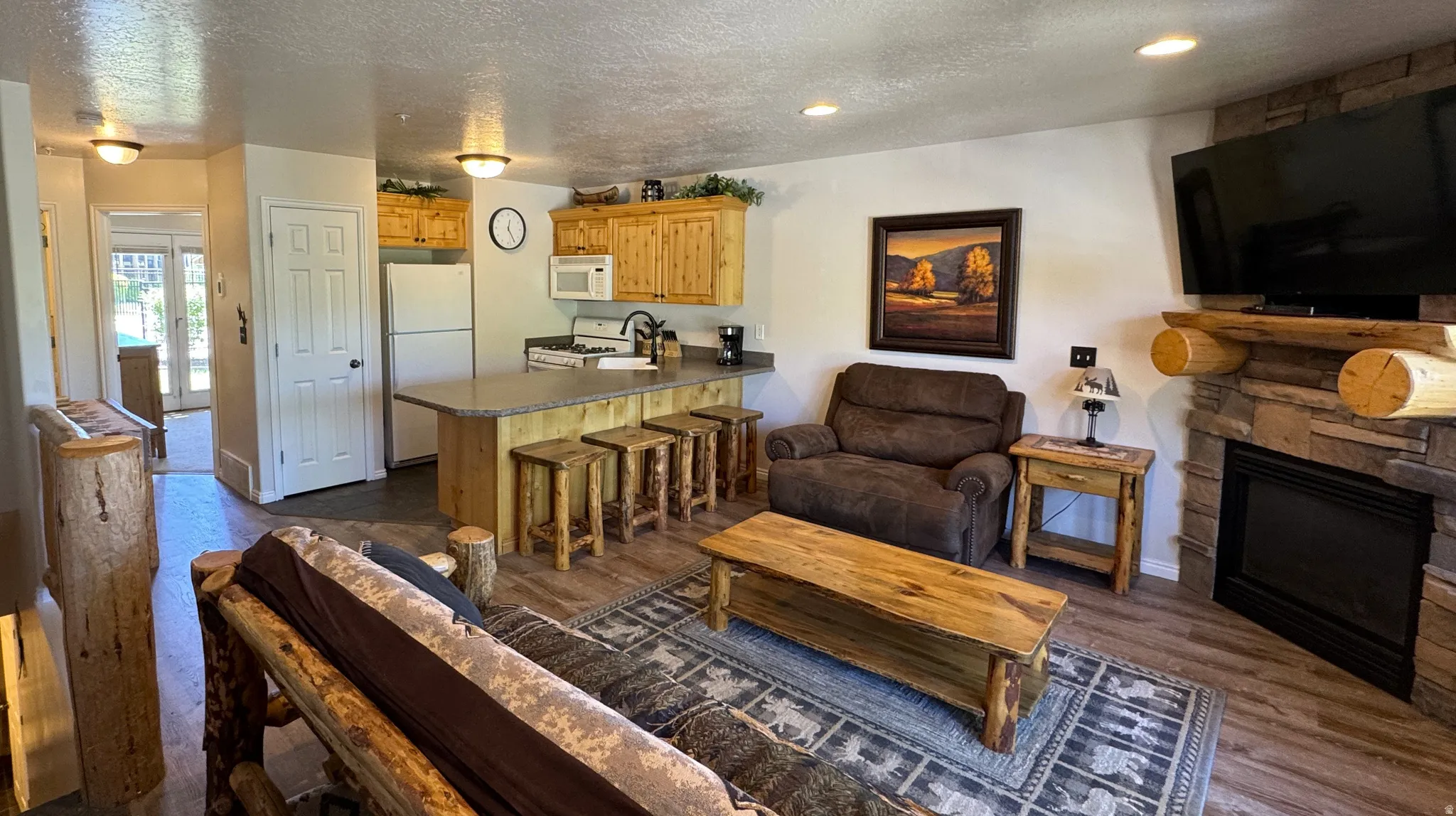 Open concept living area with gas fireplace
