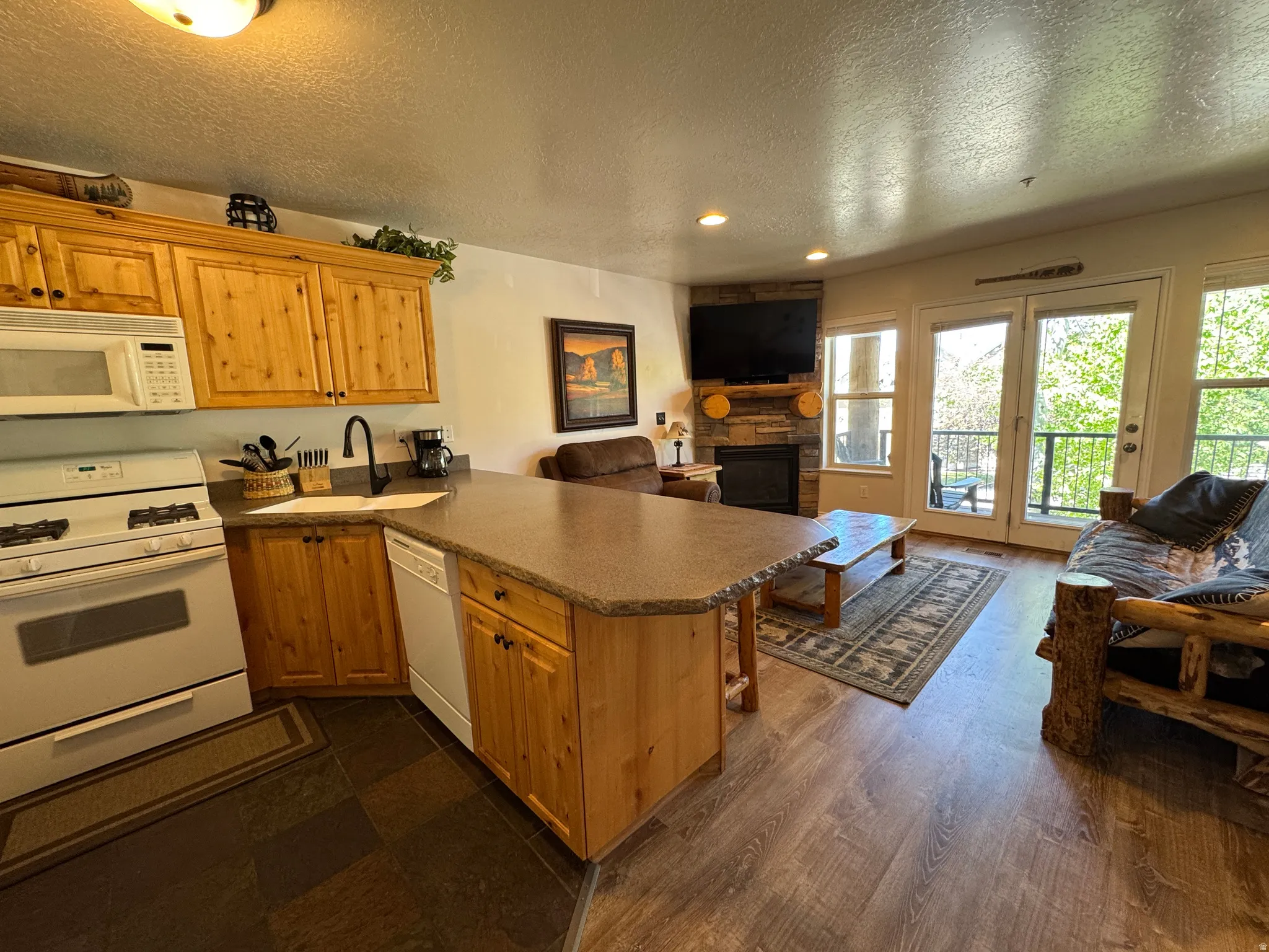 Natural lighting and access to the private deck with mountain views