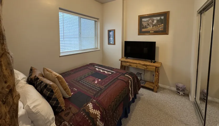 Lower level private queen size bed and closet