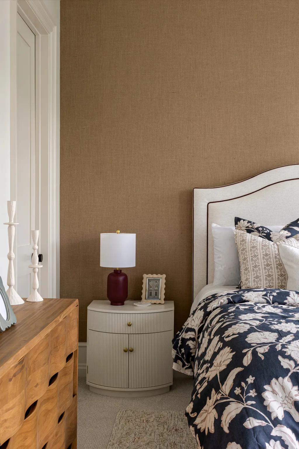 Upholstered headboard with accent trim
