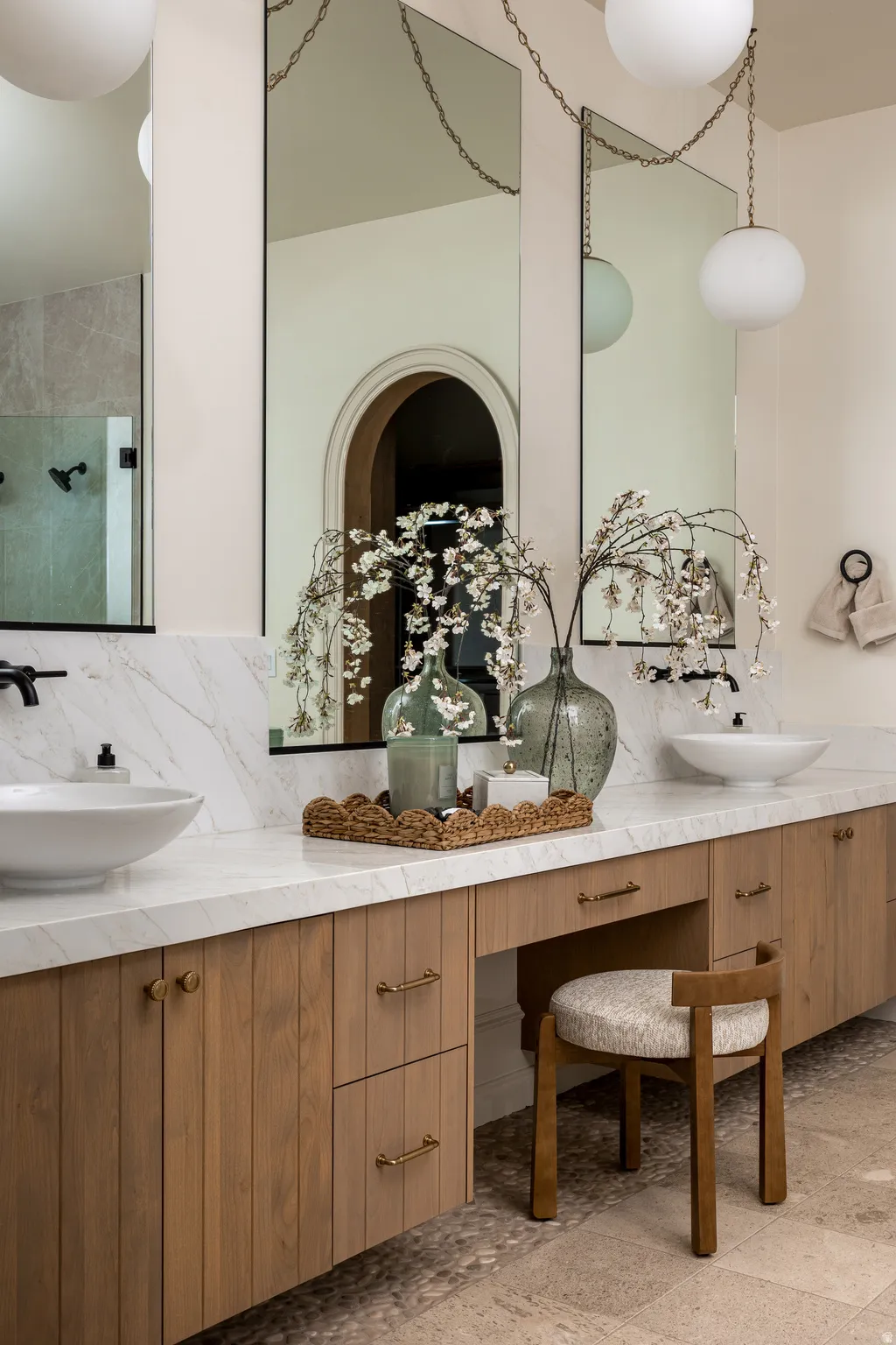 Dual vessel sinks on a spacious countertop