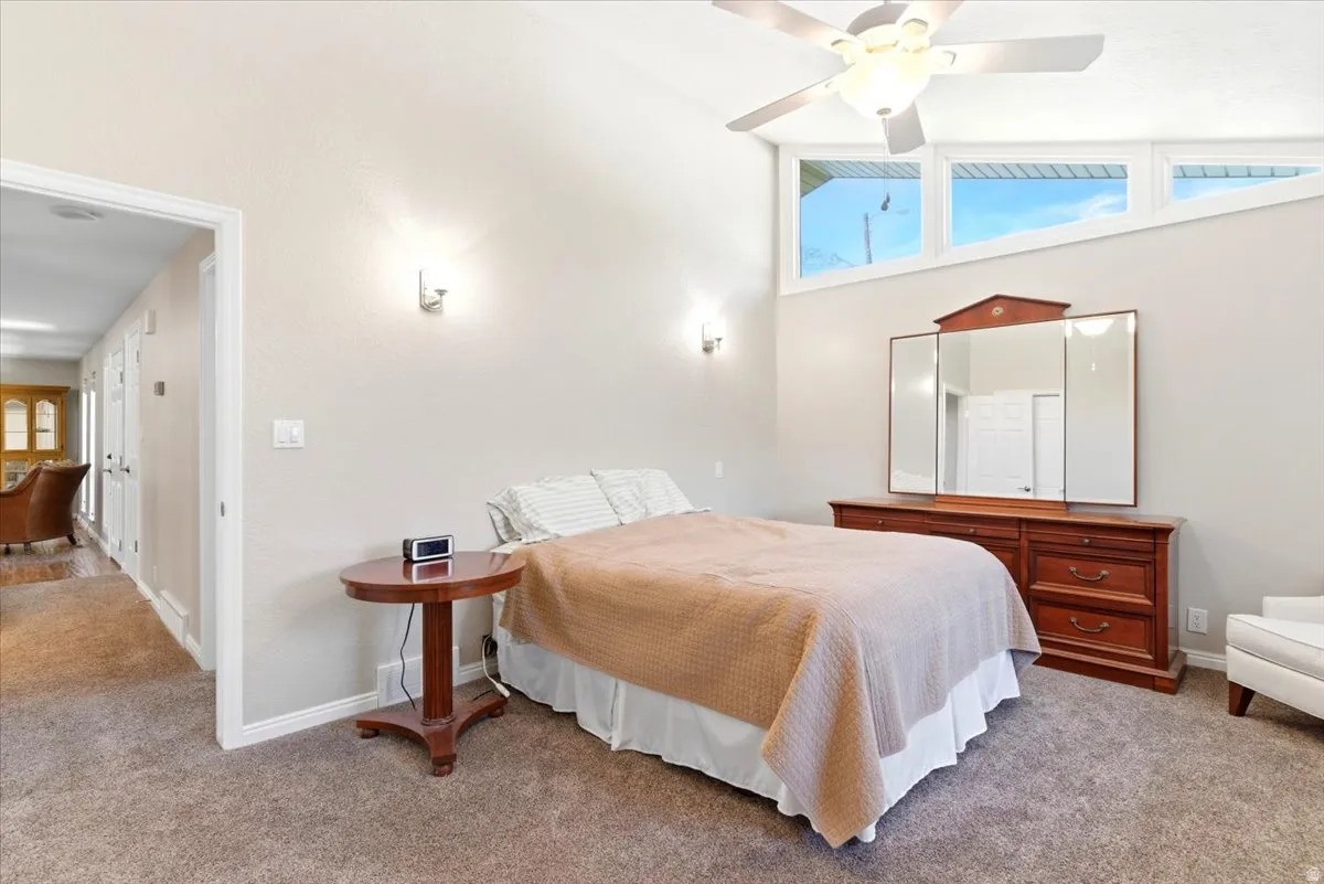 Large primary suite on main floor, with 2 closets (1 walk-in), updated bathroom, double vanity with quartz