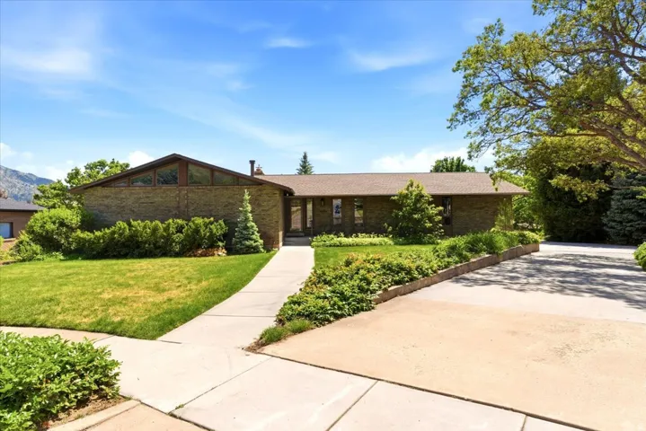 Well-maintained rambler on nearly 1/2 acre lot