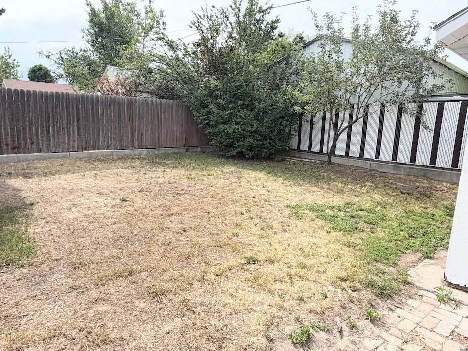 Fully Fenced Back Yard.