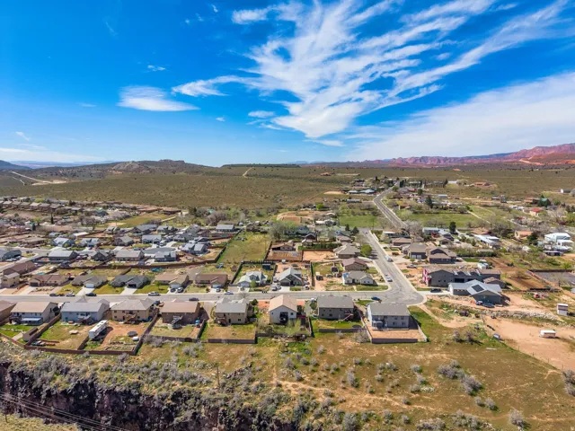 Expansive aerial perspective showcasing a residential development with varied architectural styles