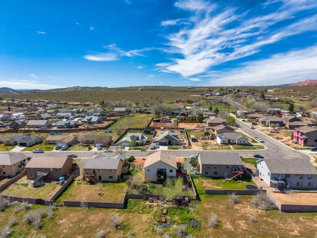 Residential neighborhood featuring diverse home styles and paved streets