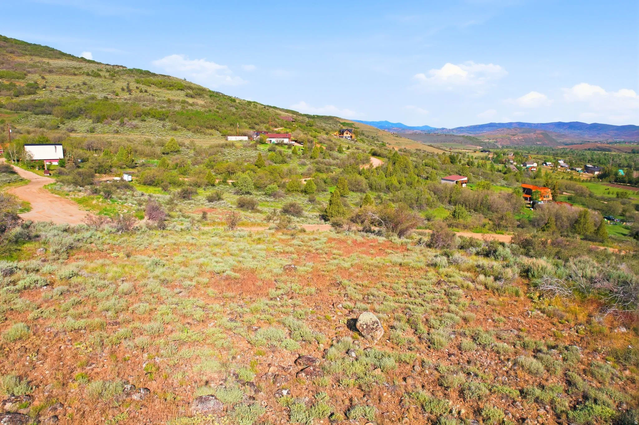 Expansive hillside parcel with a broad natural landscape