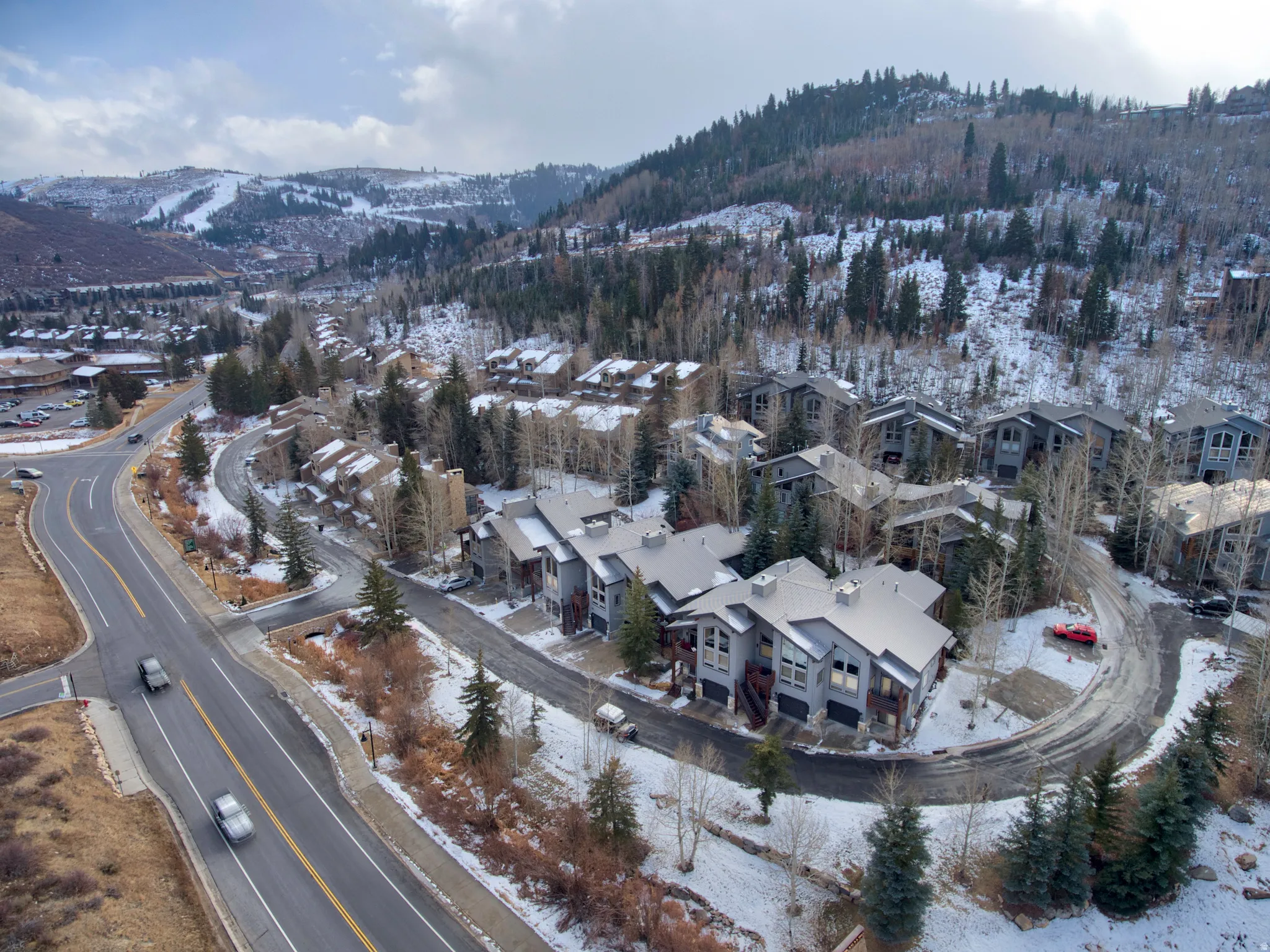 Aerial perspective of a multi-unit property featuring contemporary architectural styles
