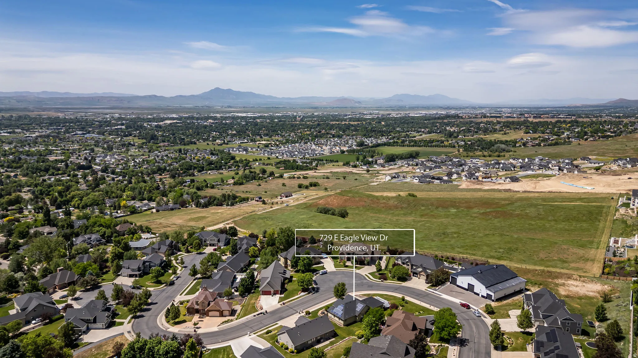 Residential community with established housing and undeveloped land
