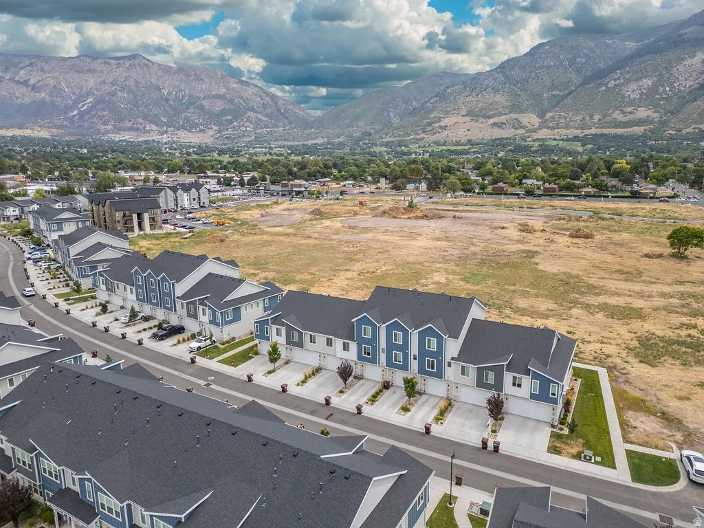 Modern townhomes featuring multi-tone facades and individual garage access