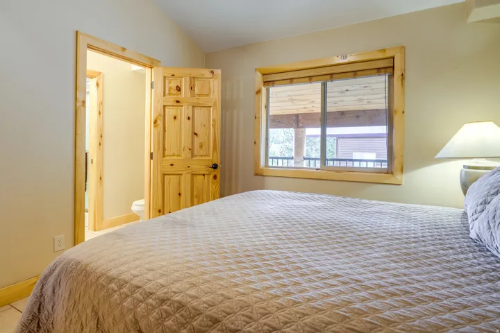 Room with light-toned walls and wood-finish trim