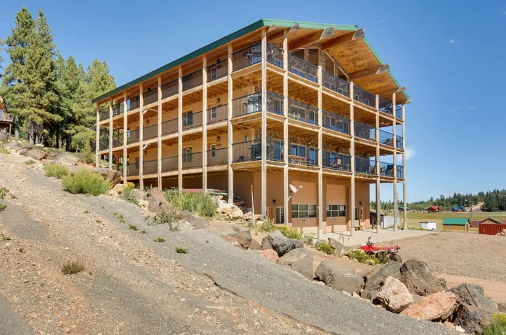 Multi-level building with expansive balconies on each floor