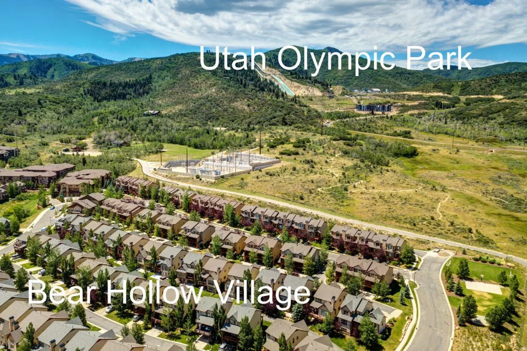 Bear Hollow Village community featuring rows of modern townhomes with varied rooflines and facades