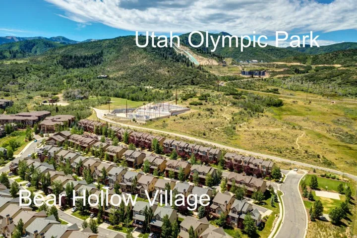 Bear Hollow Village community featuring rows of modern townhomes with varied rooflines and facades