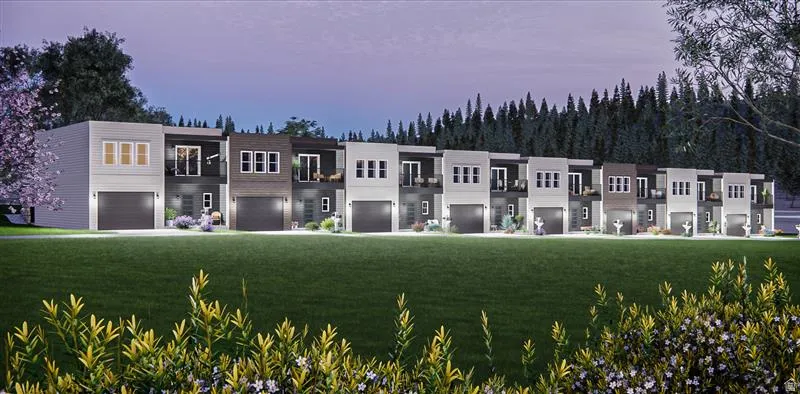 Contemporary townhome row featuring diverse exterior finishes including light siding, dark siding, and dark paneling