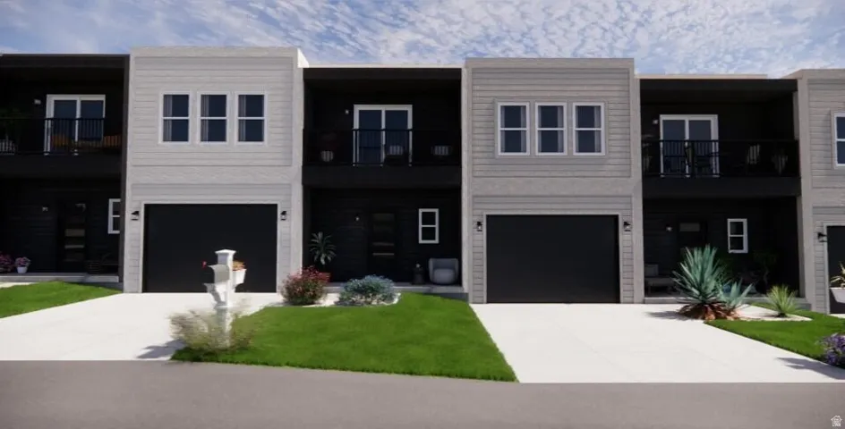 Contemporary townhome exterior featuring light gray horizontal siding and dark contrasting panels