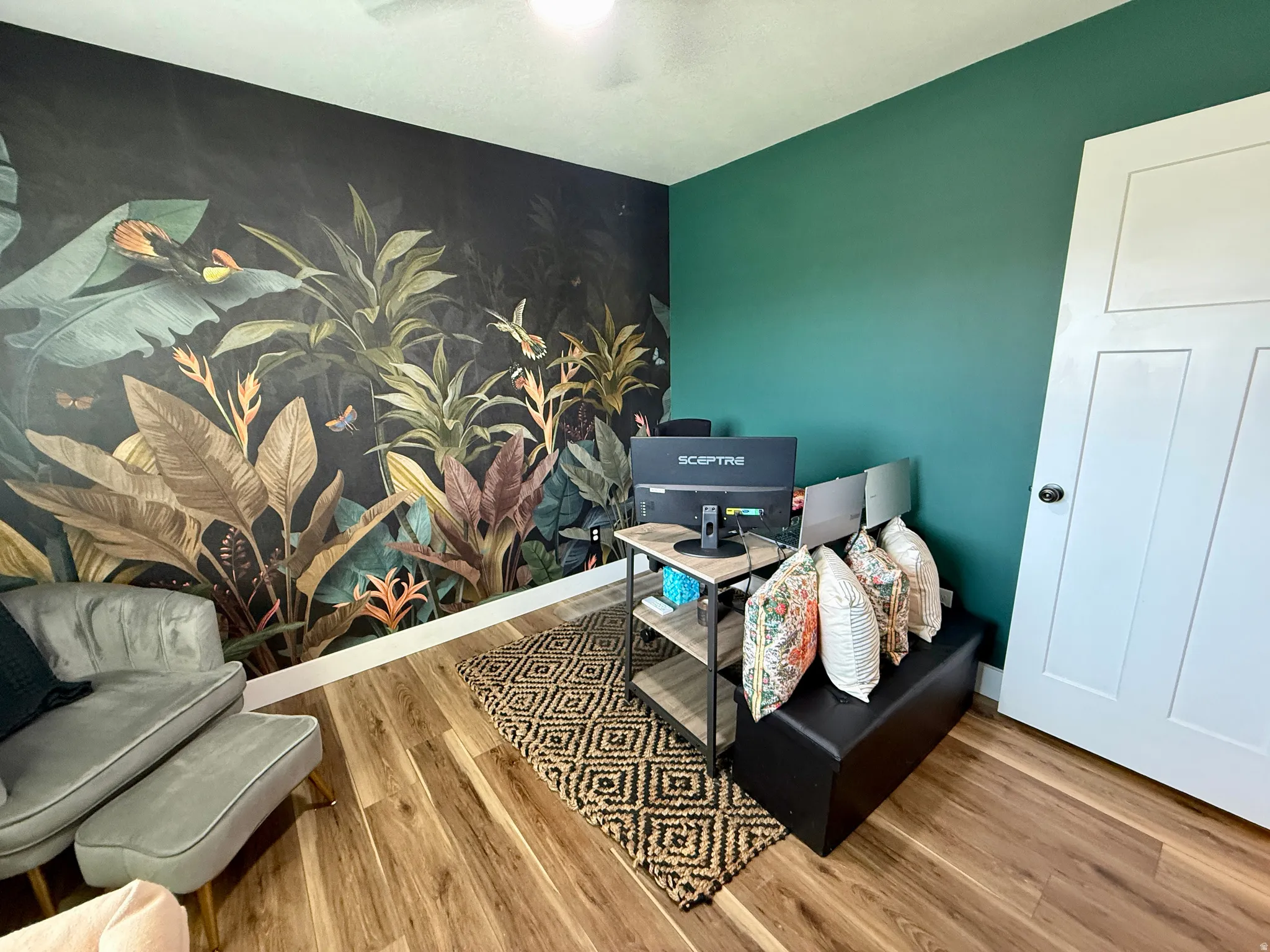 Feature wall with botanical-themed mural