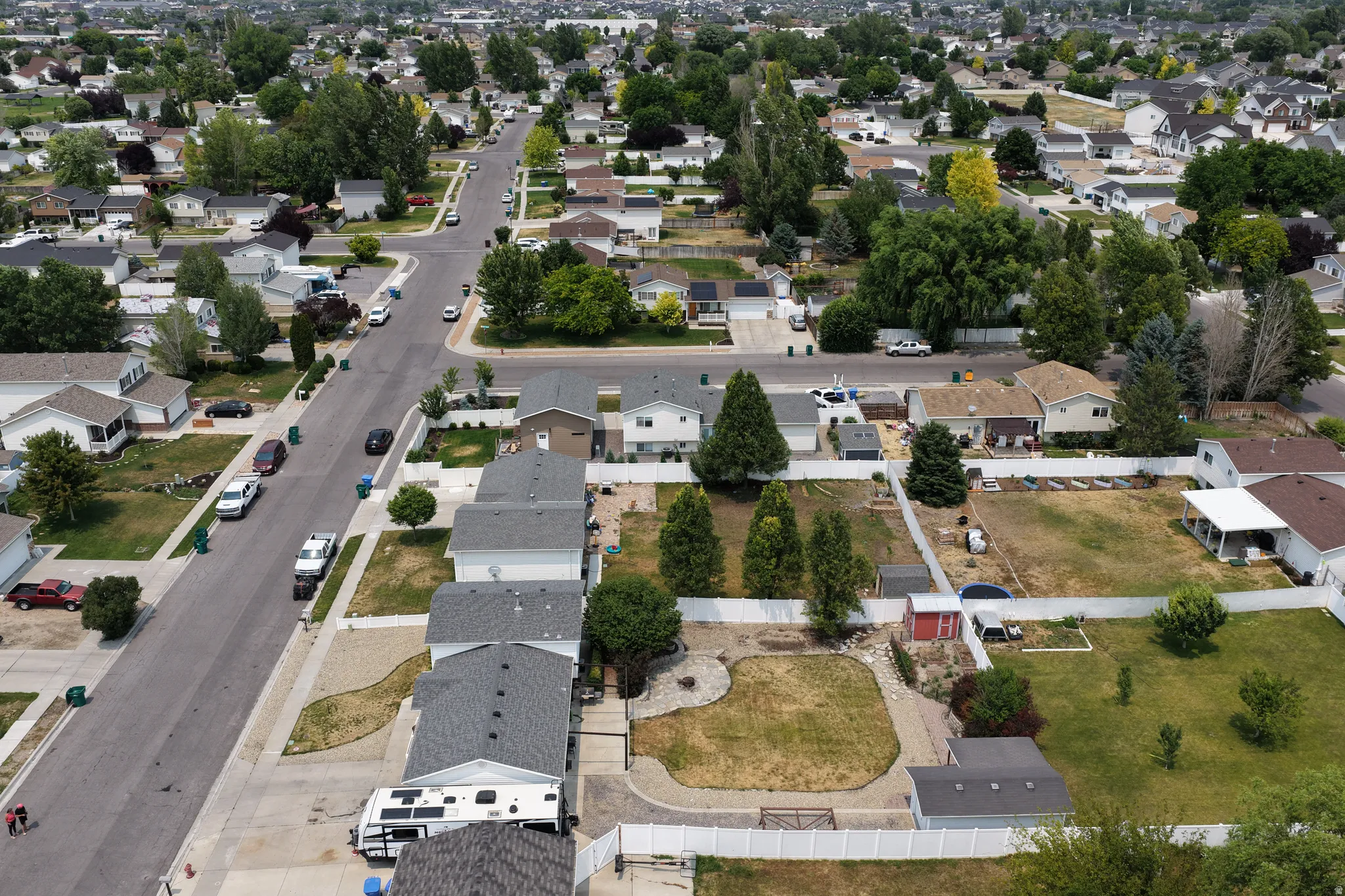 Residential neighborhood featuring mature trees and established homes