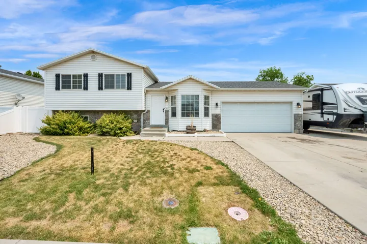 Tri-level home with 2-Car garage and RV parking.