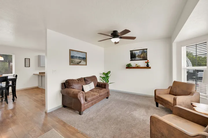 Front living room, west facing, featuring bay window.