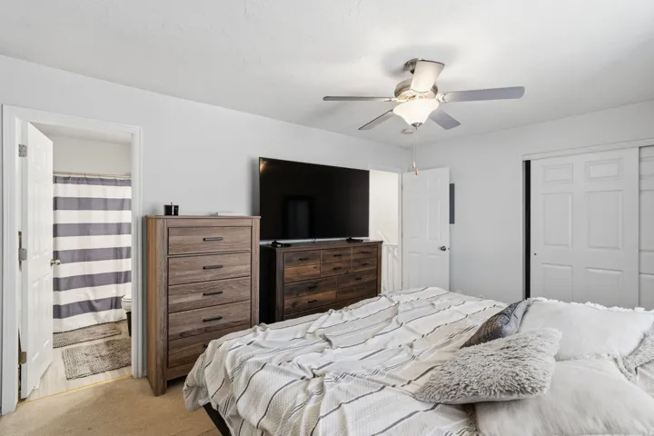 Bedroom featuring carpet flooring and light-toned walls