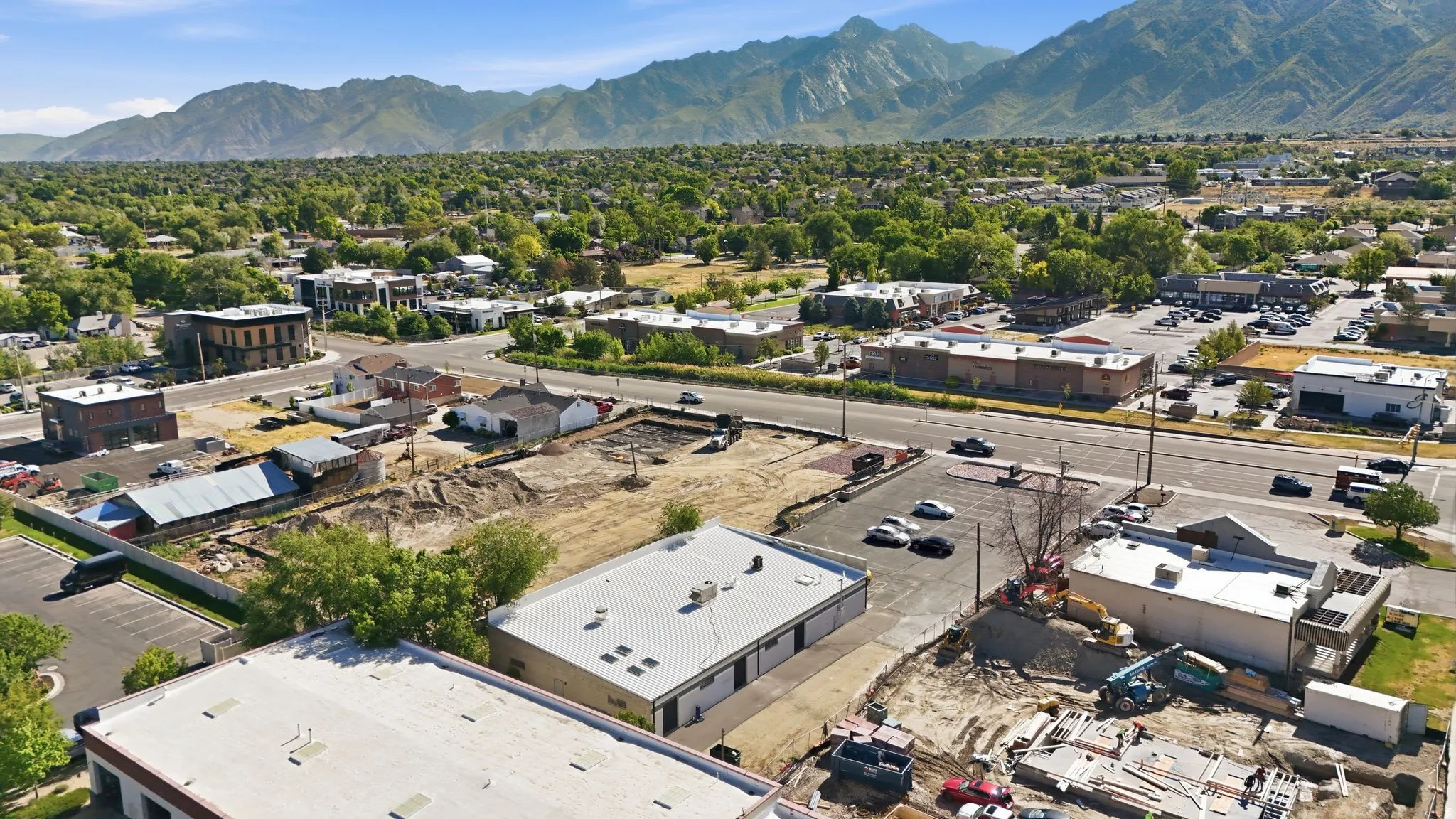 Expansive undeveloped lot presenting opportunities for commercial development, featuring a clear, level grade for building