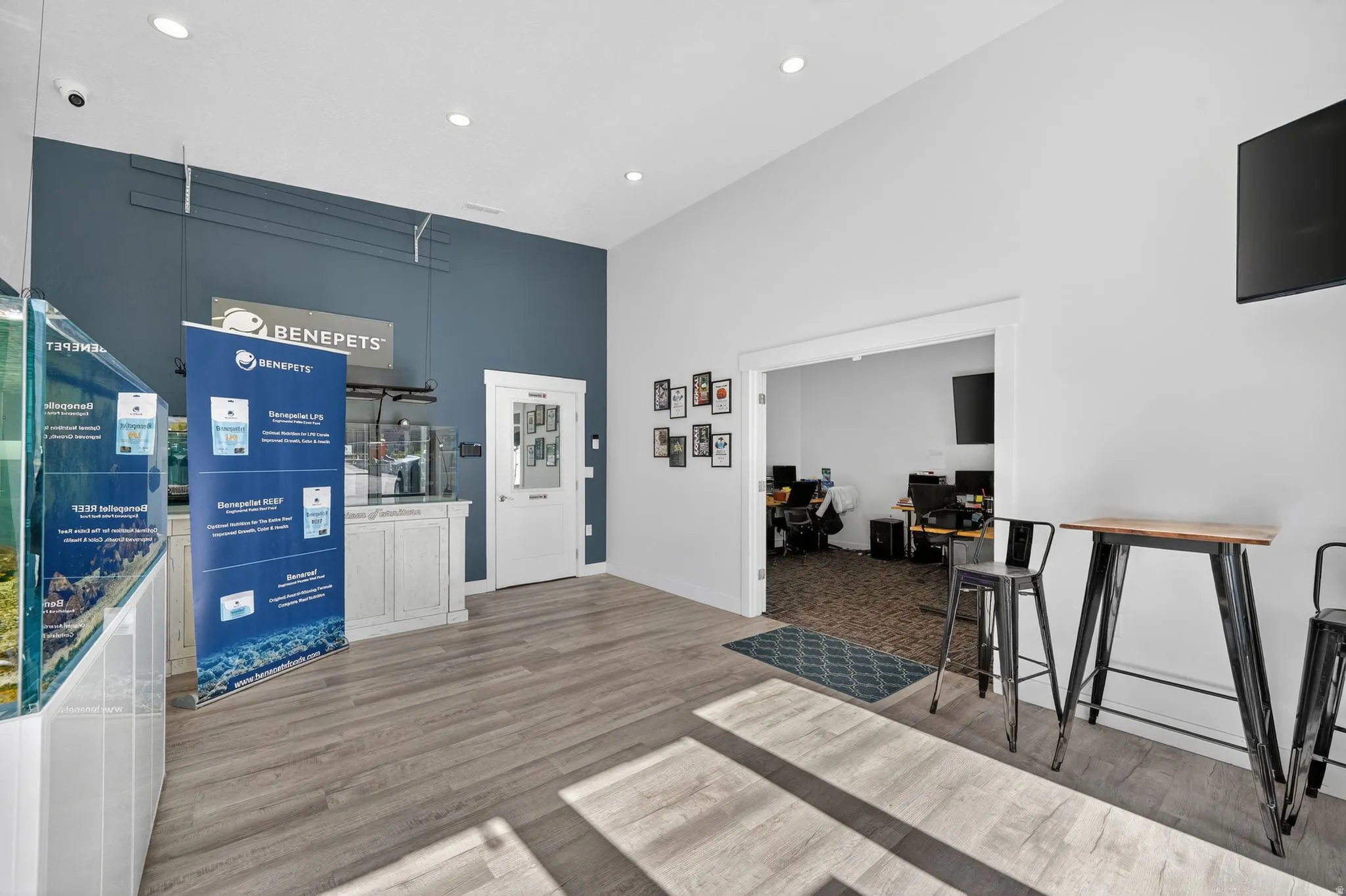 Spacious interior featuring wood-finish flooring and recessed lighting