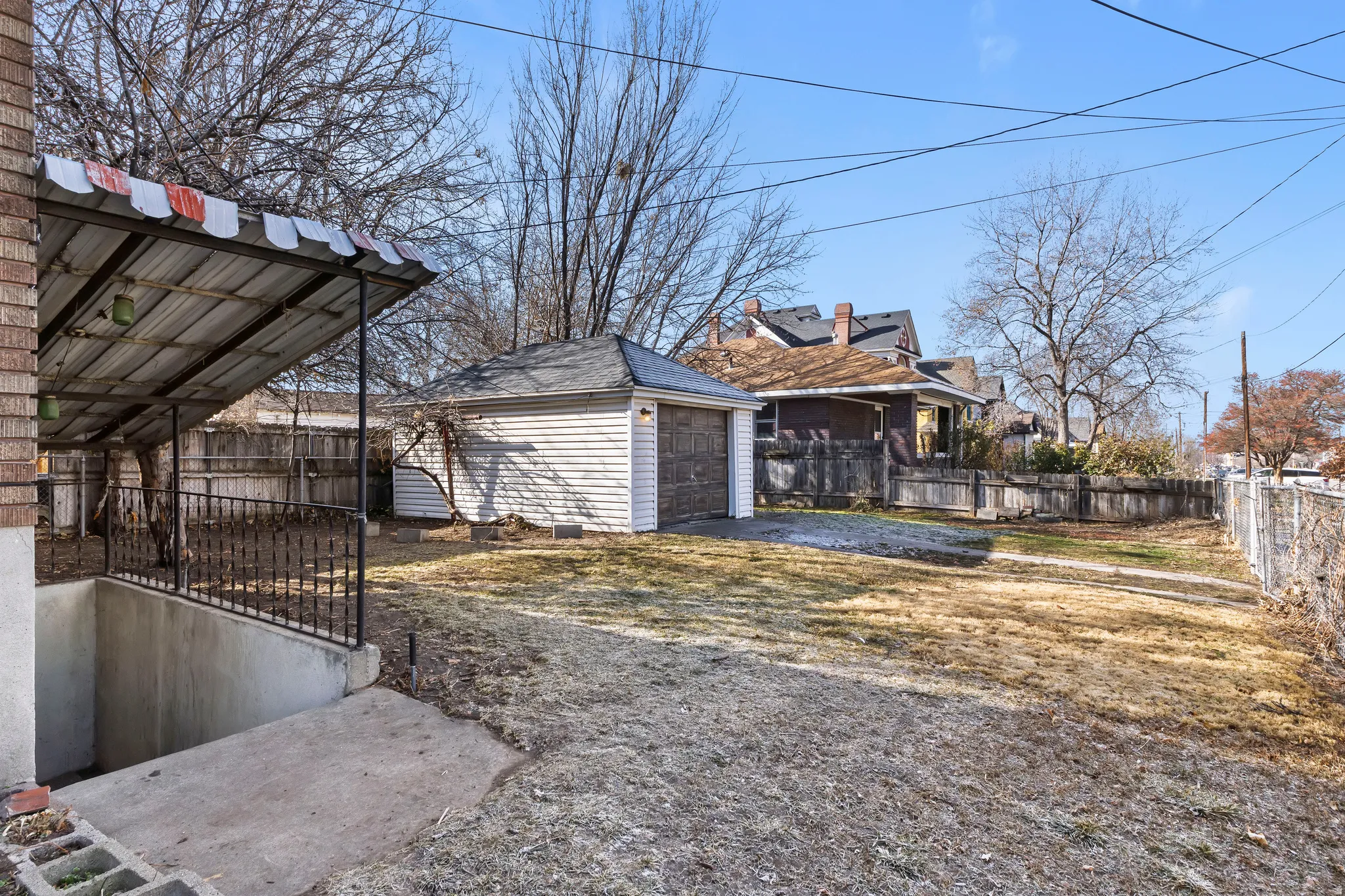Detached garage with horizontal siding
