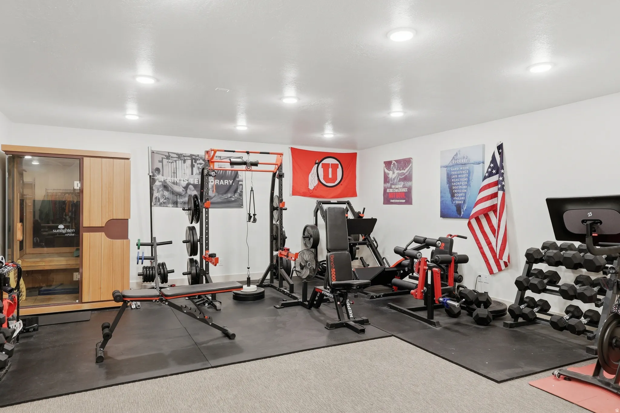 Flex room, Dedicated fitness room featuring recessed lighting, light-toned walls, and a combination of carpet and rubber mat flooring