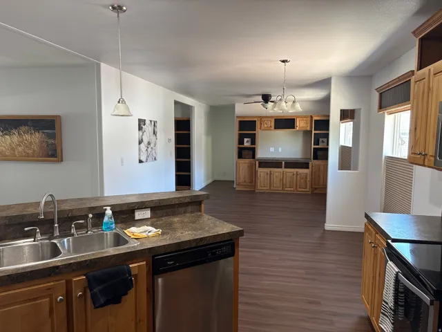 Kitchen island with double basin stainless steel sink and integrated dishwasher