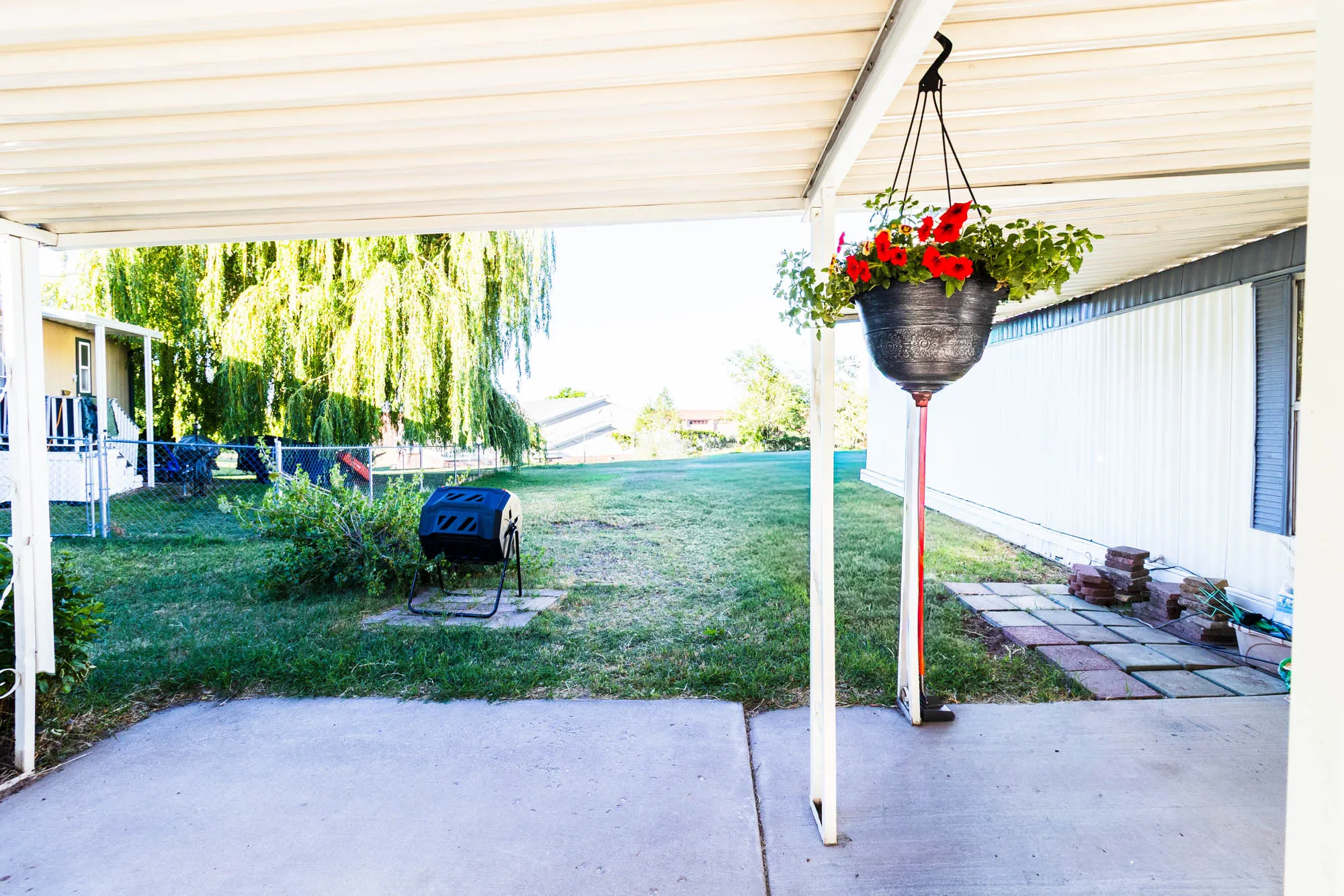Looking through the carport toward the backyard