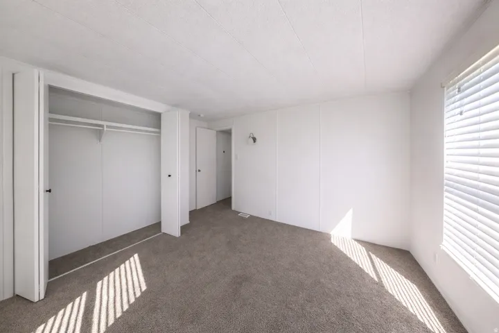 Image from 2 yrs ago before move-in. This is the larger of the 3 bedrooms.