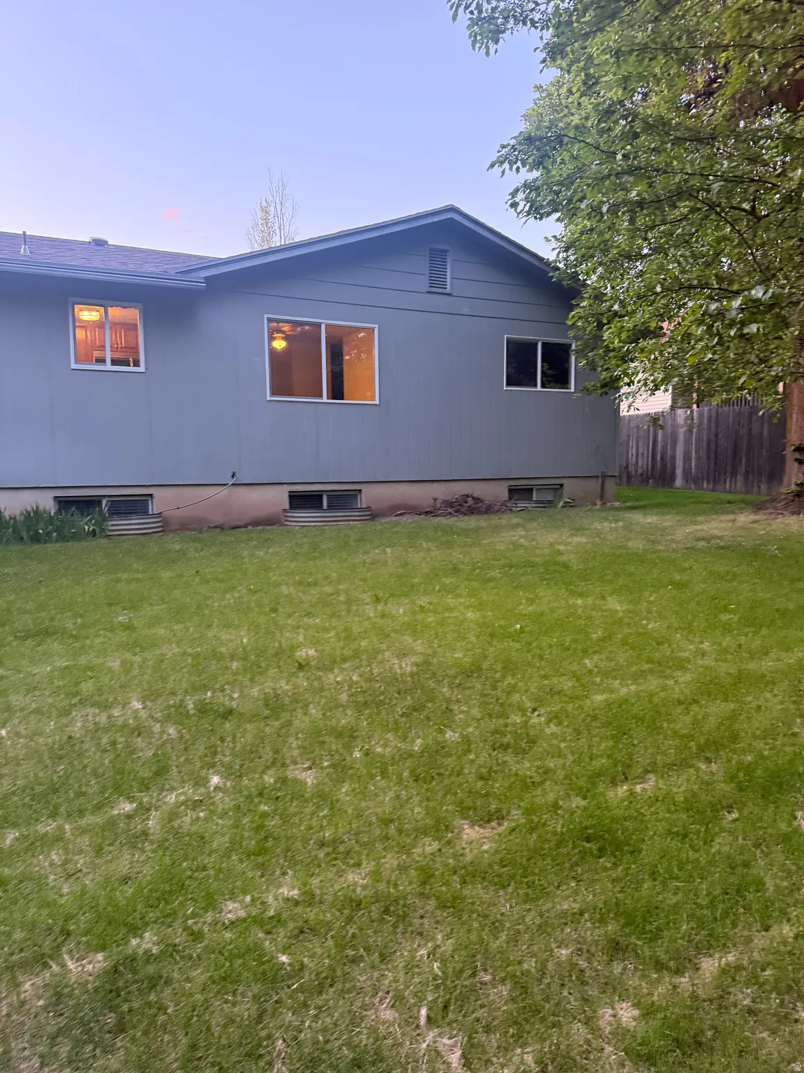 Expansive lawn space bordering the property
