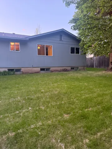Expansive lawn space bordering the property