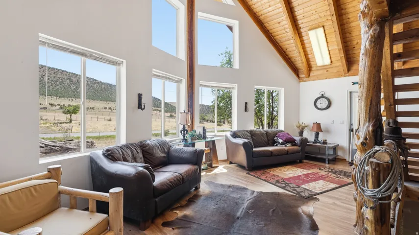 Vaulted wood-paneled ceiling with exposed beams