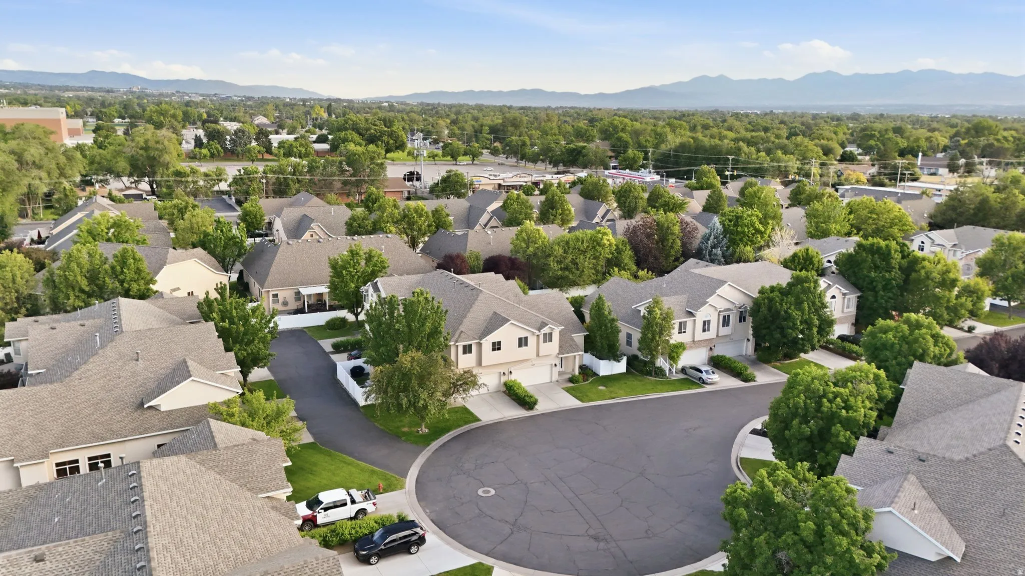 Neighborhood setting with established residential properties and mature trees