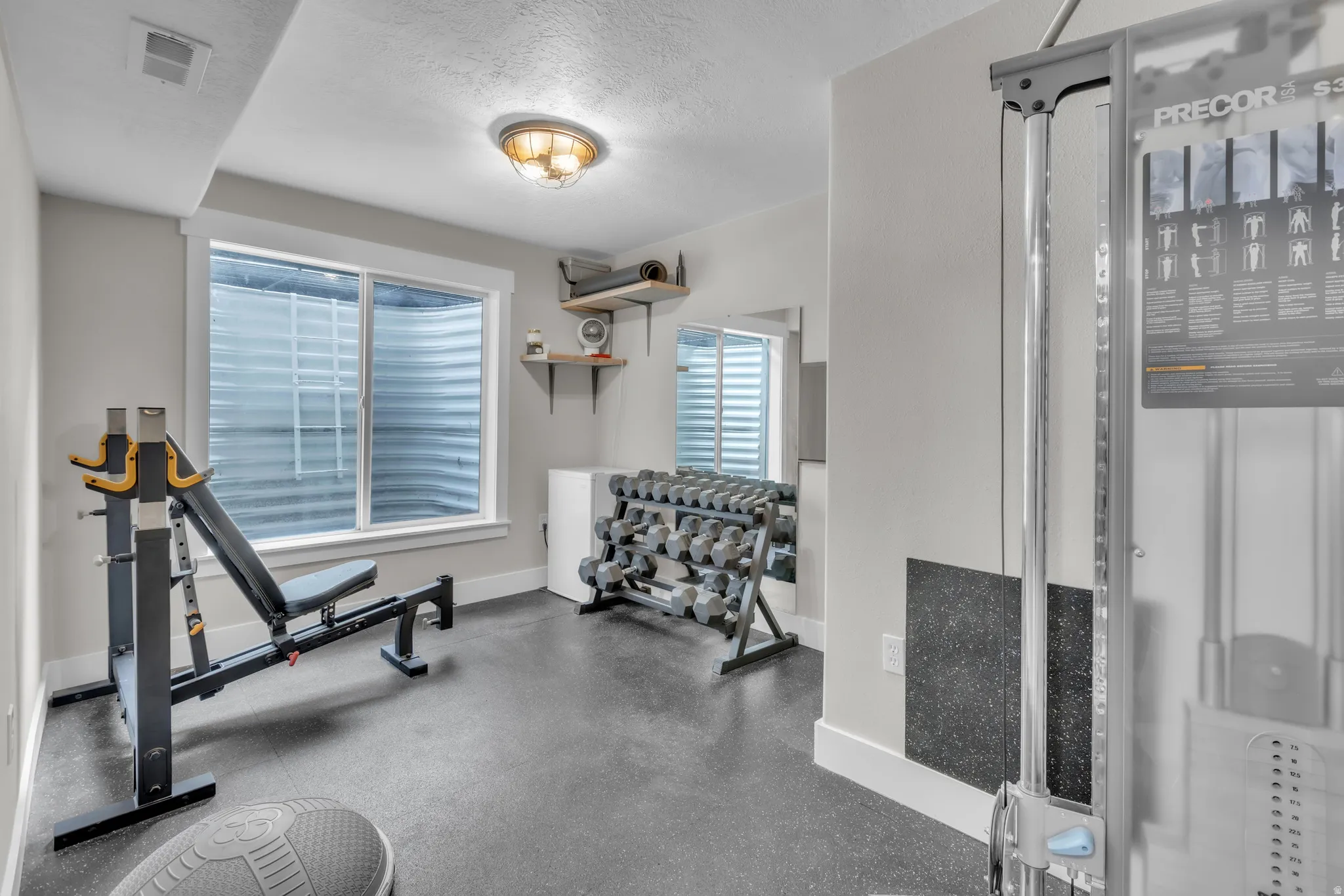 Bedroom set up as an exercise room