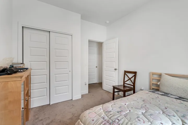 White paneled bi-fold closet doors