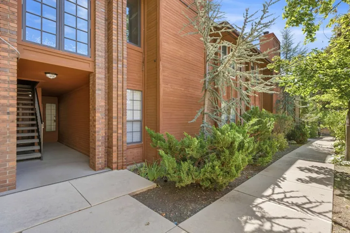 Brick exterior with contrasting wood-tone siding