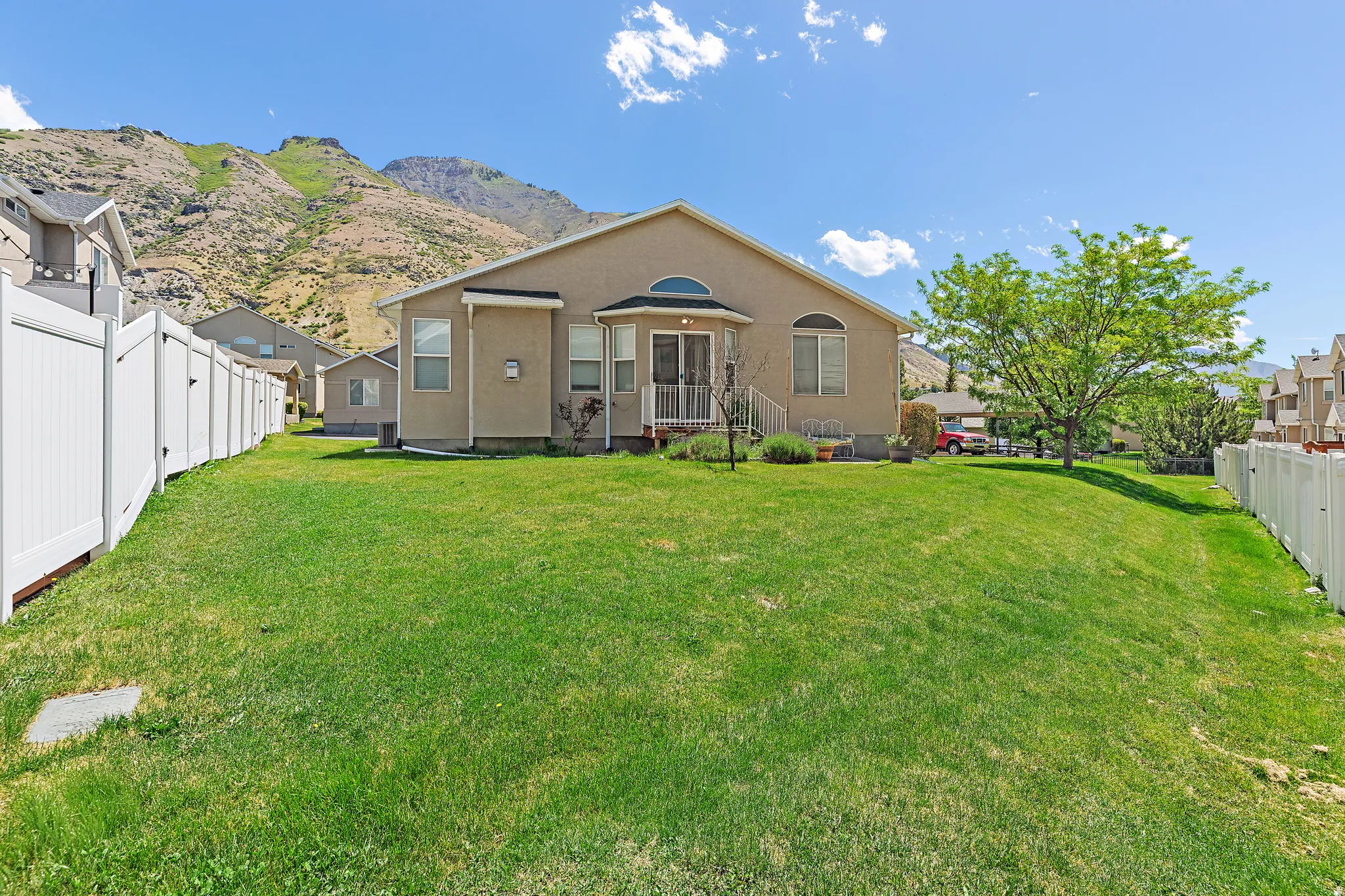 Expansive green lawn providing ample outdoor space