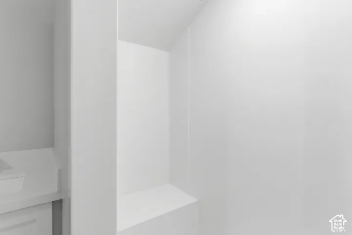 Integrated storage niche with a built-in shelf