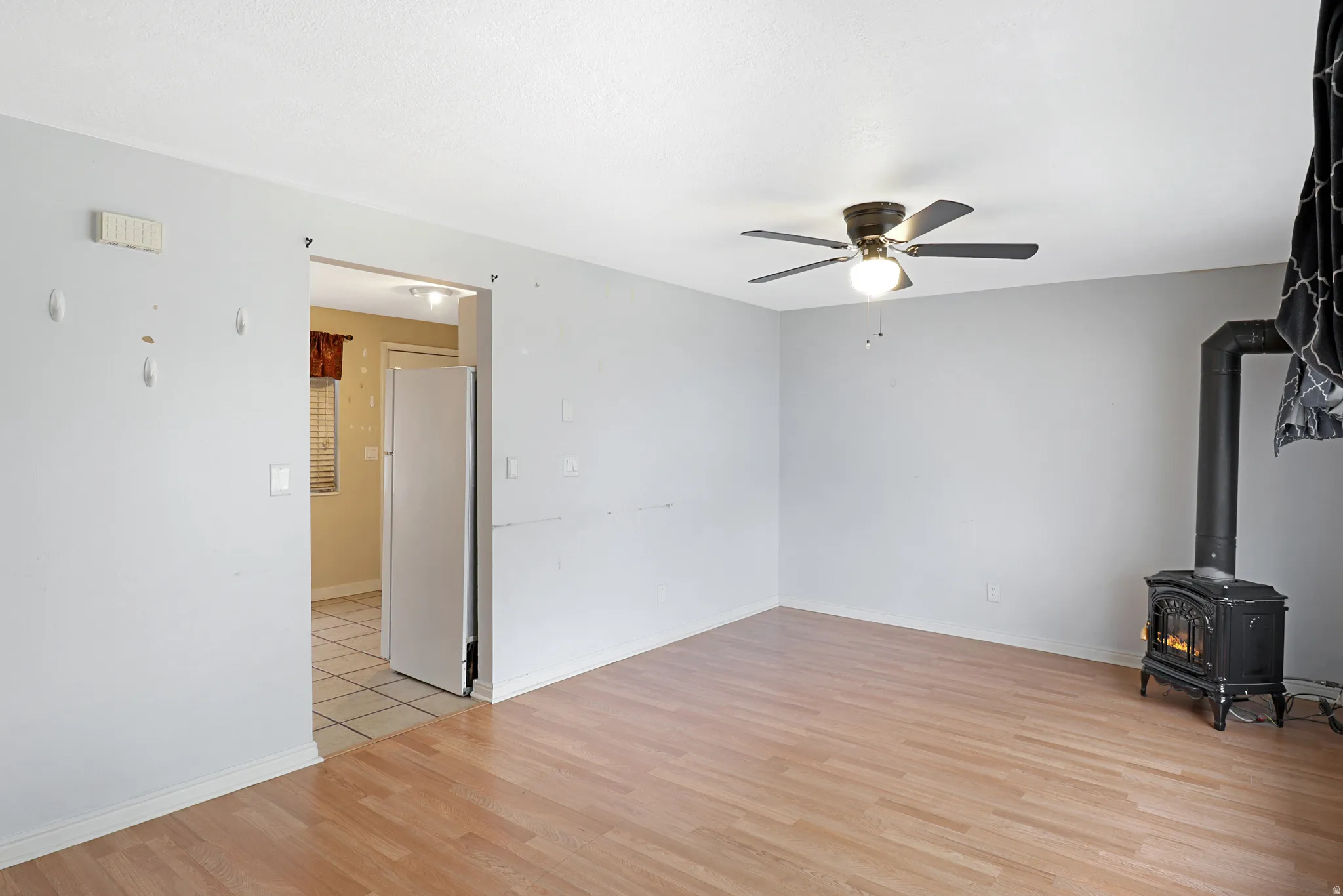 Opens to Kitchen