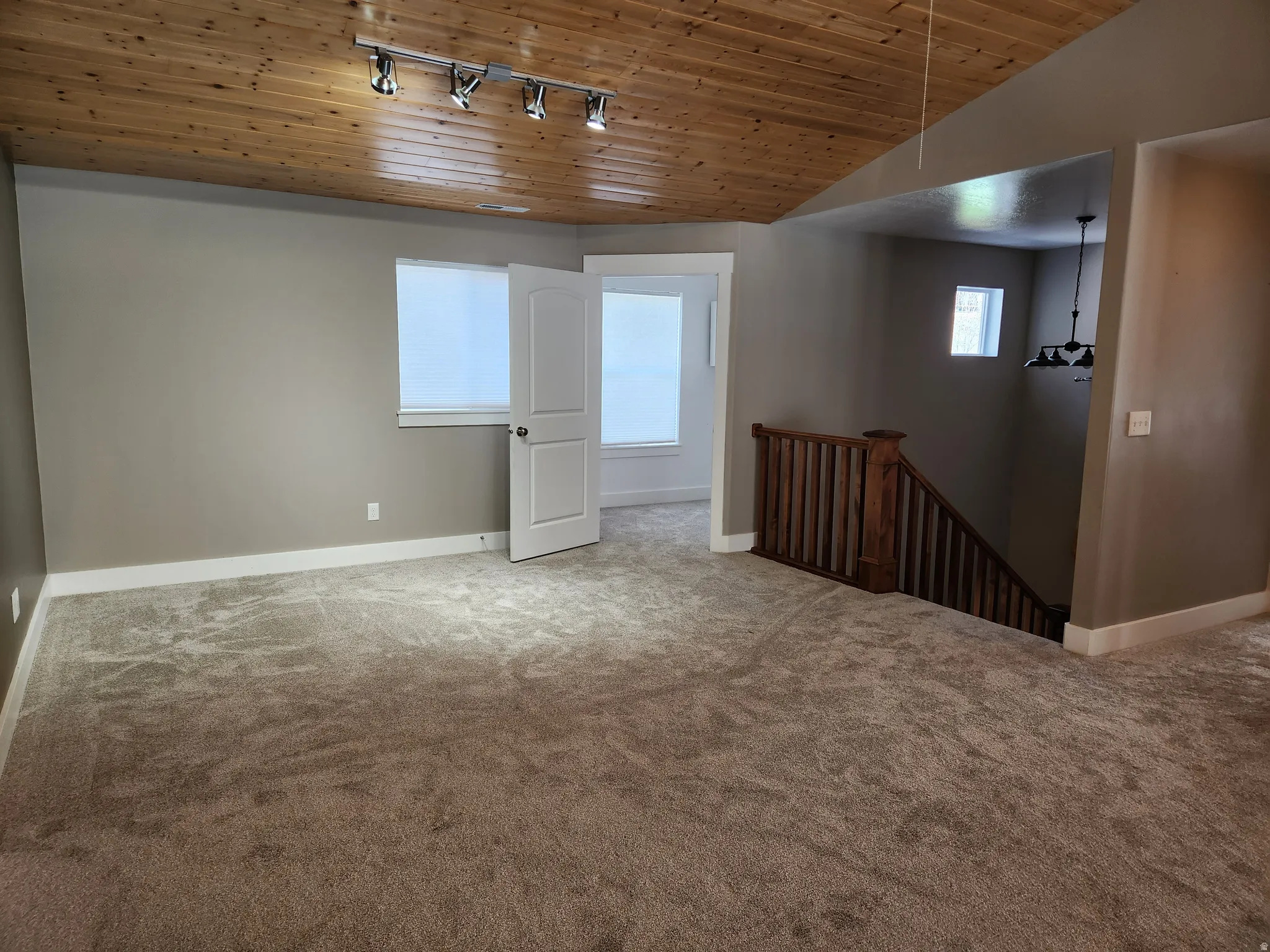 Upstairs great room with large walk-in closet. Previously used as a sewing room.