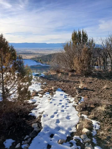 Expansive valley and mountain backdrop
