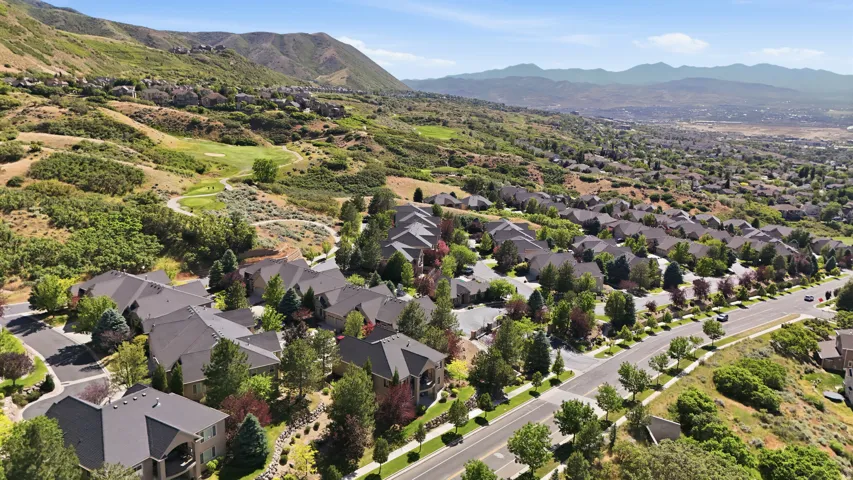 Residential community featuring mature landscaping, paved roads, and a  nearby golf course and hiking trails