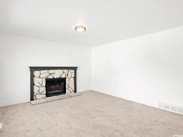 Neutral-toned carpeting paired with white walls