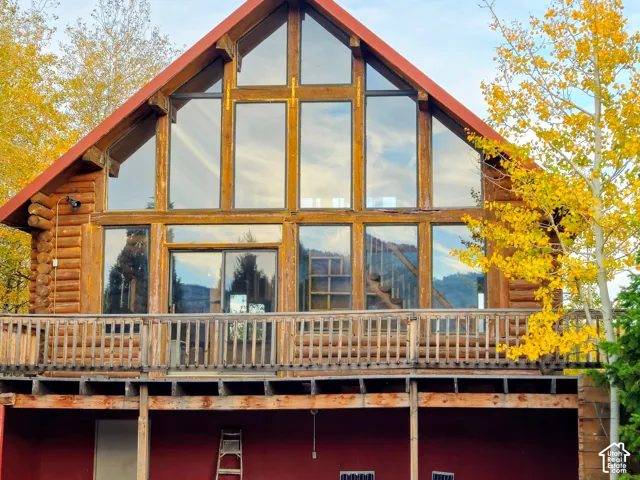 Log-sided exterior with a prominent A-frame design